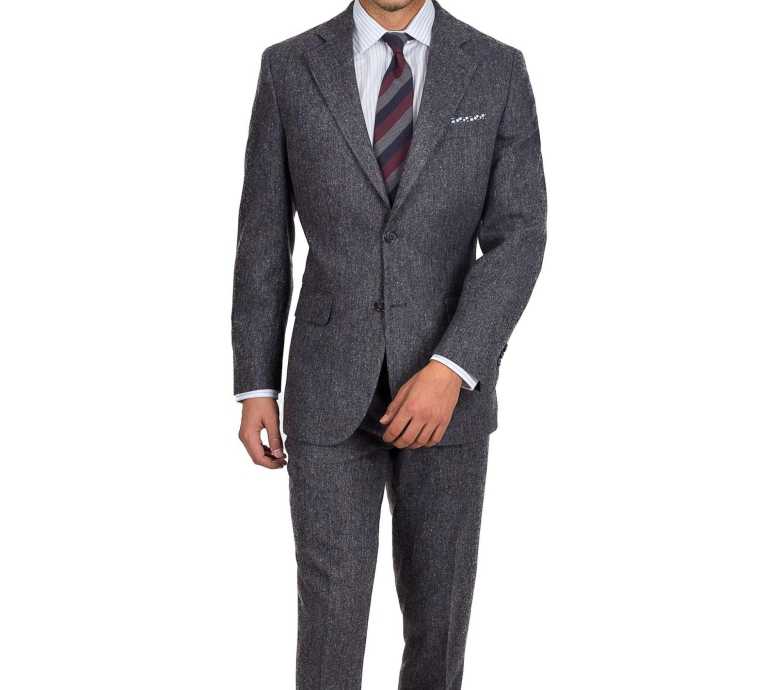 A dark grey Donegal tweed suit by Oliver Wicks