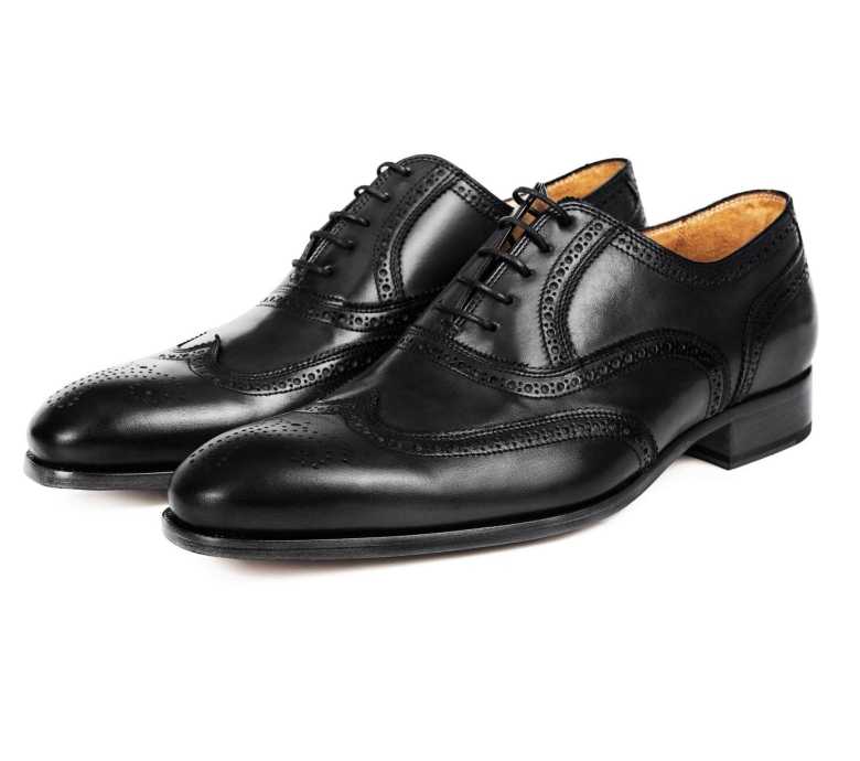 Black cap-toe Oxford shoes by Oliver Wicks