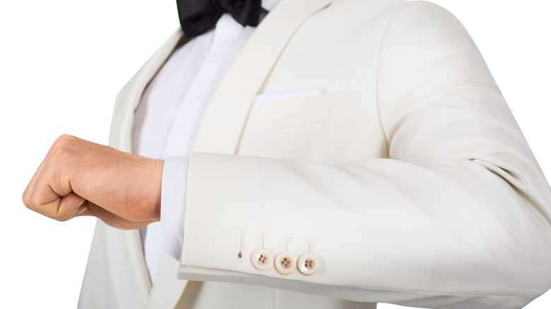 A close-up image of an ivory dinner jacket