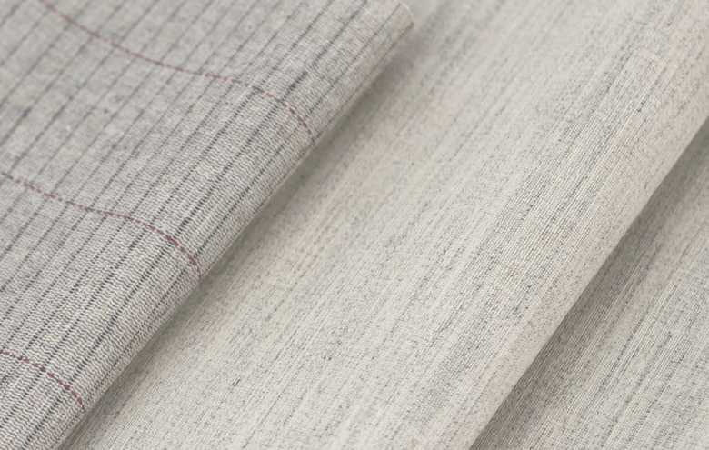 A close-up image of fabric used to make suits