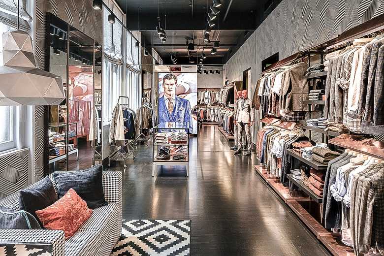 an inside look of a SuitSupply store