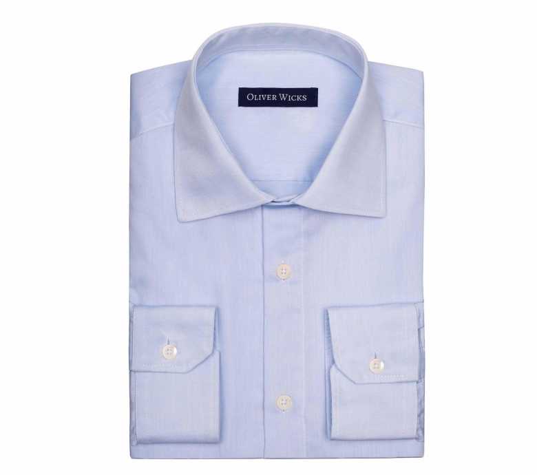 A Iight blue non-iron cotton twill shirt by Oliver Wicks