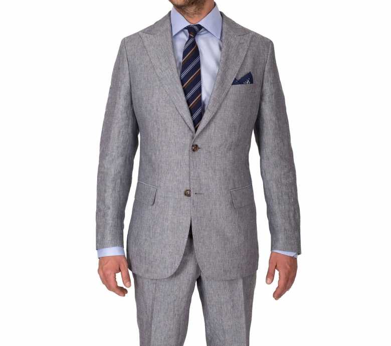 a light gray suit by Oliver Wicks