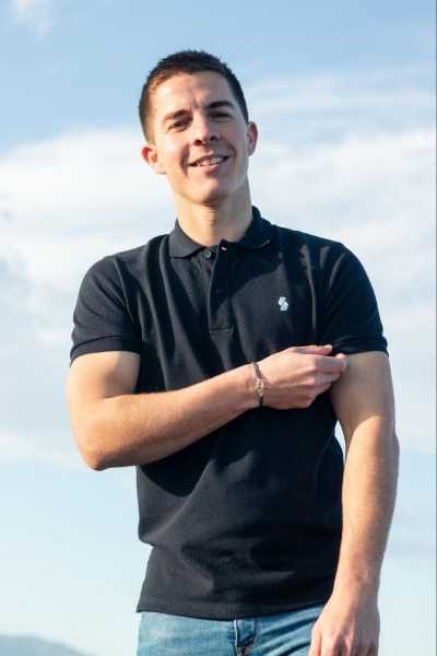 a man wearing a polo shirt