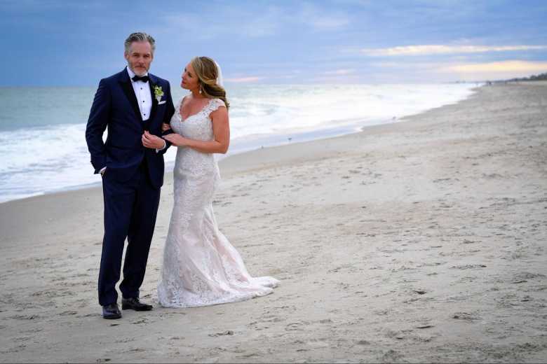 Navy Suit with White Floral Boutonniere